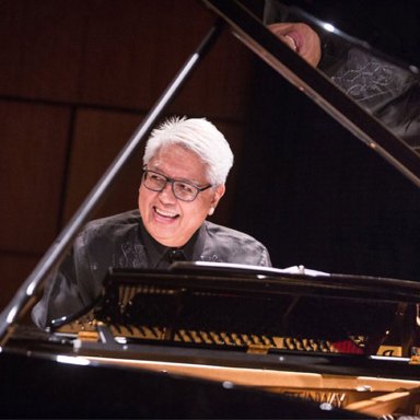 Distinguished Filipino music conductor and composer in formal attire