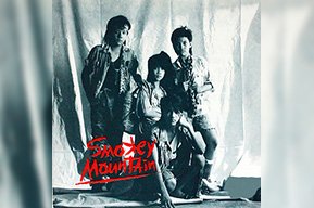 Young singers performing on stage with spotlights